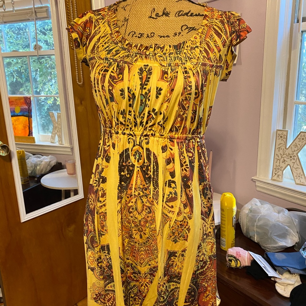 Yellow brown and orange design dress